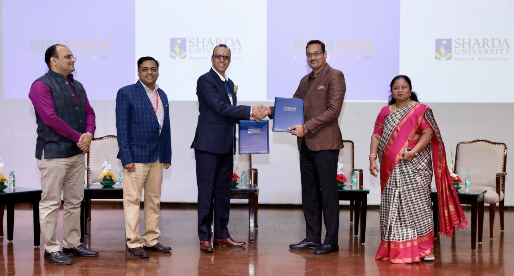 IndiaTech signing a MoU with Sharda University