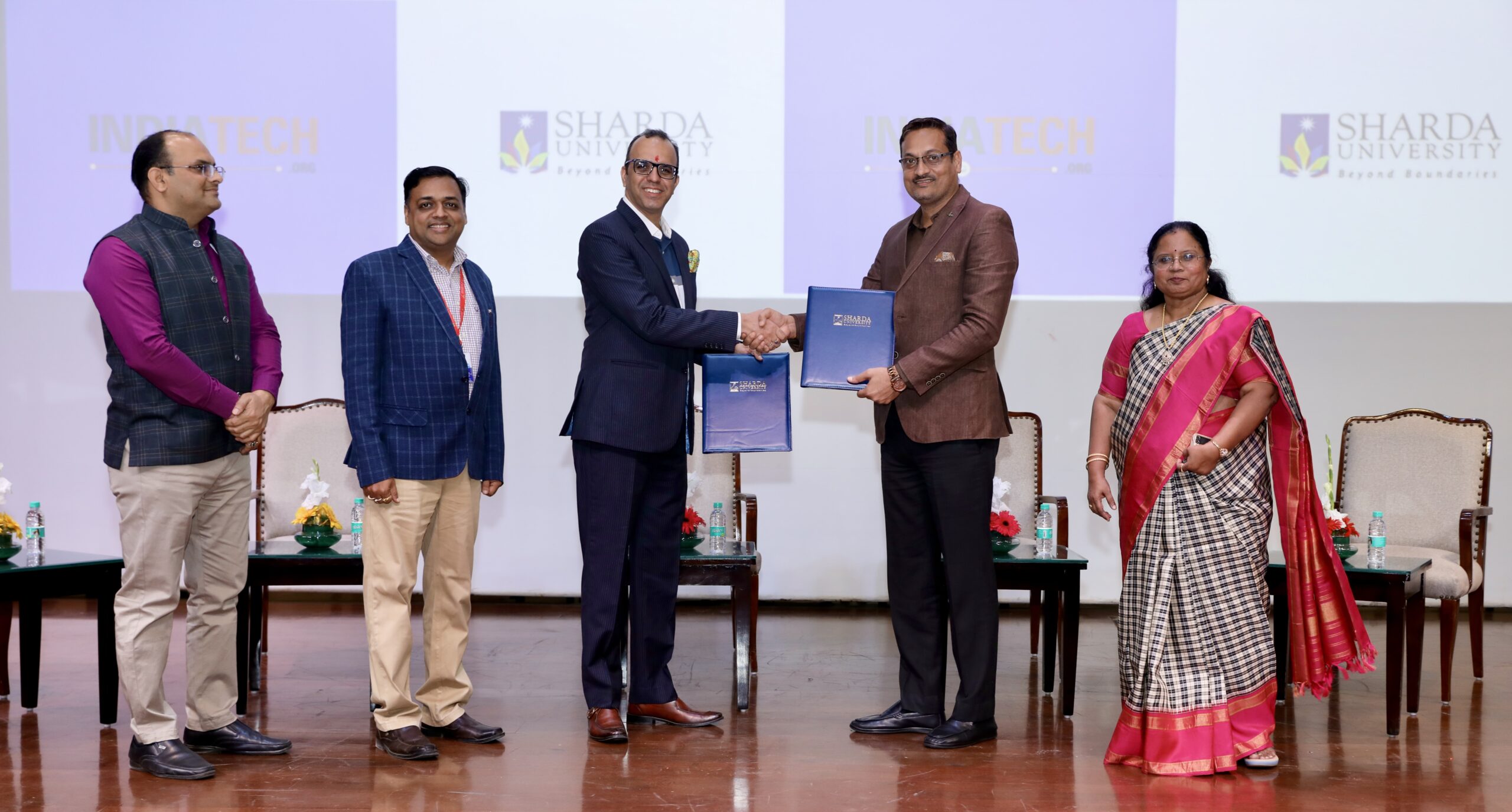 IndiaTech signing a MoU with Sharda University